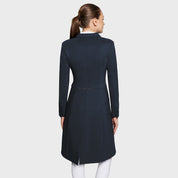 Full body back view of a female model wearing the black Samshield Premium Frac on a plain background