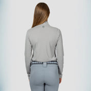 Back view of a model wearing Dapple Gray Equinavia Juni Long Sleeve Quarter Zip Shirt on a plain background