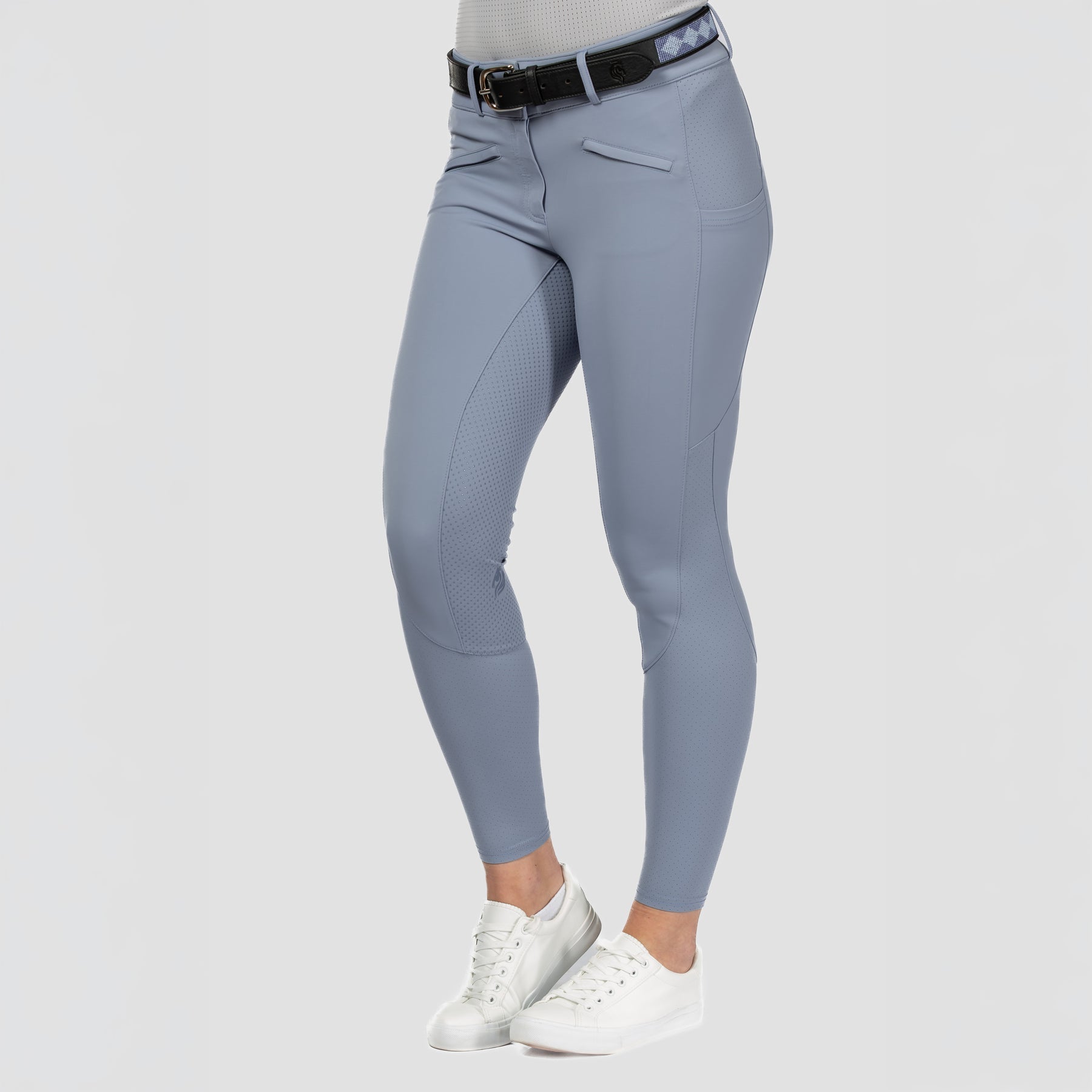 Front view of a model wearing Dusk Blue Equinavia Birgit Summer Full Seat Breeches on a plain background
