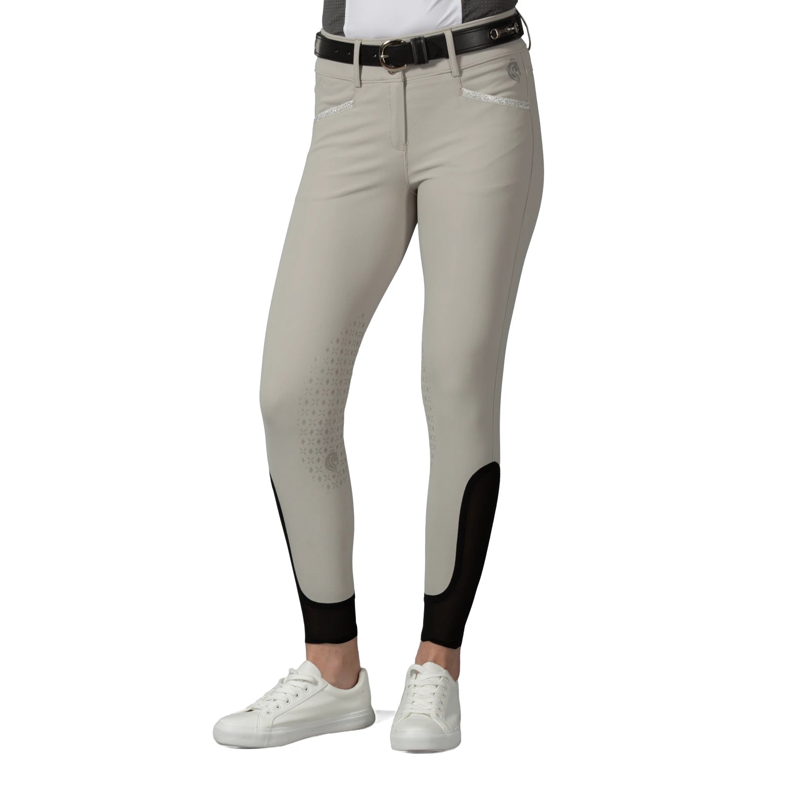 Front view of a model wearing the tan Equinavia Kristina Knee Patch Breeches on a white background