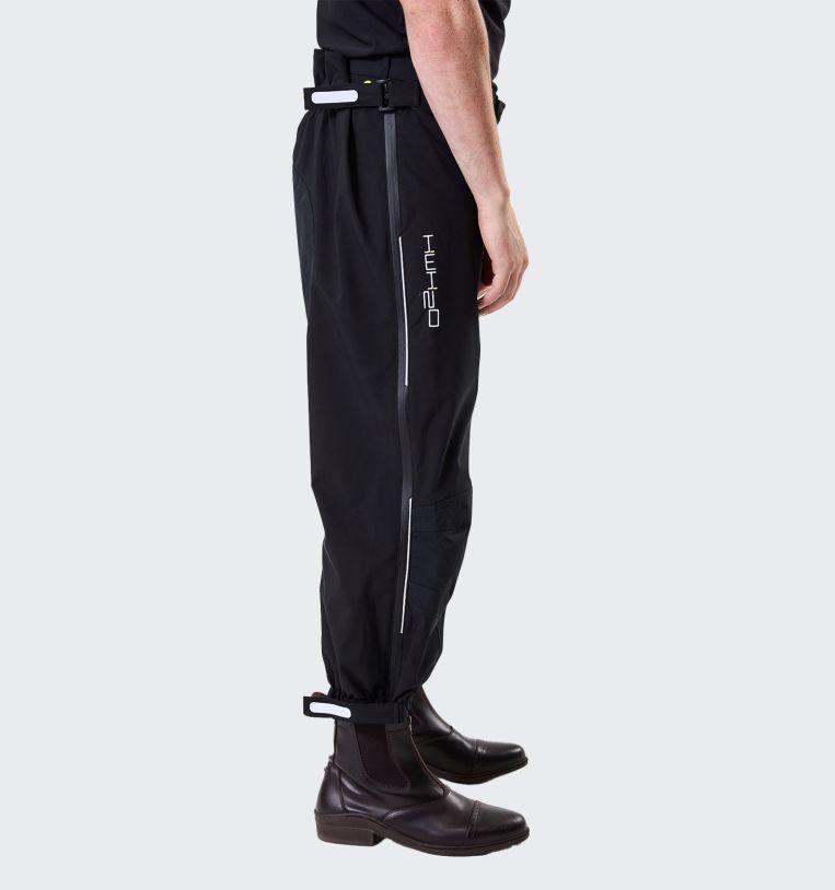 Model wearing Horseware H2O Trousers in black, side view
