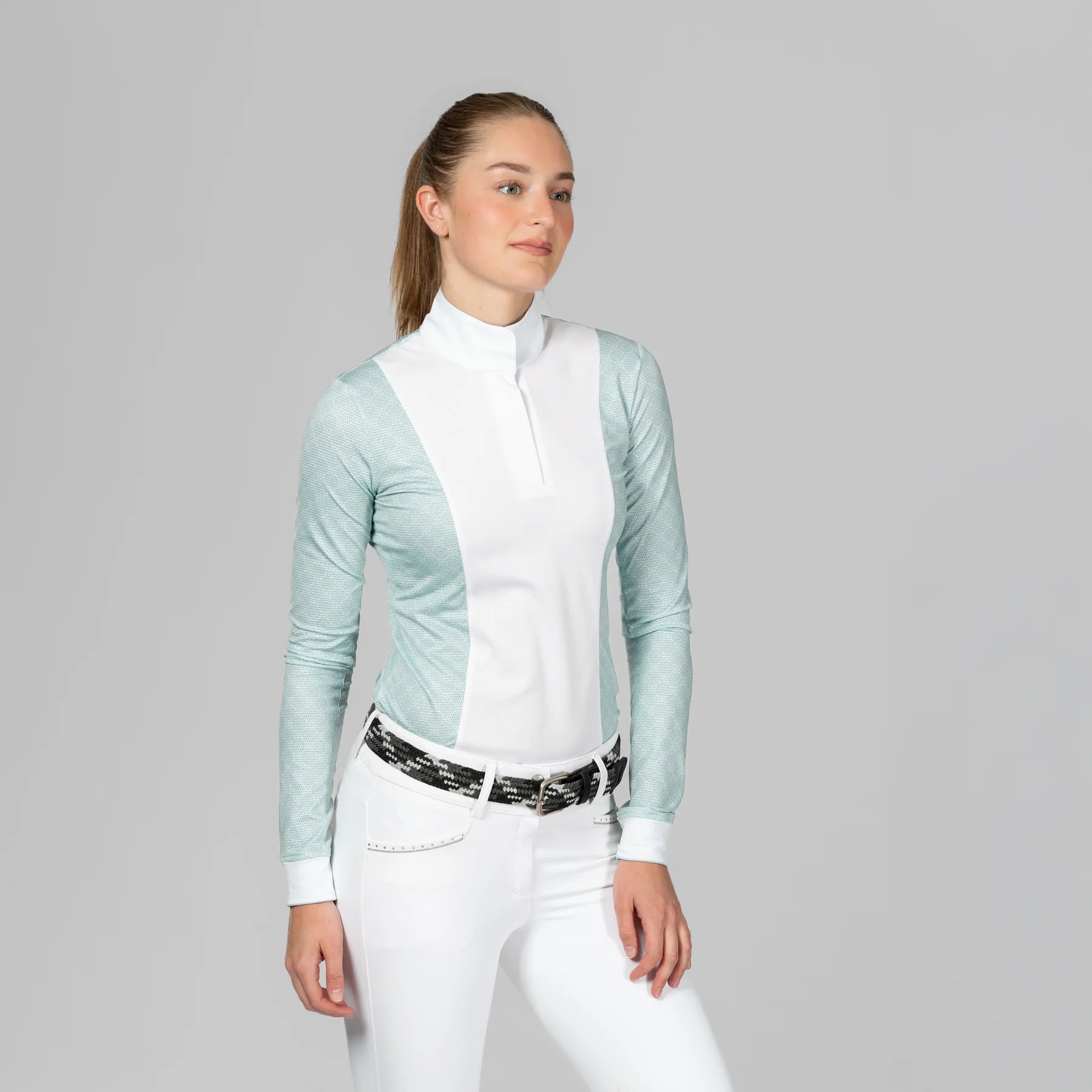 Angled front view of a model wearing Green Sprout Equinavia Martha Long Sleeve Show Shirt on a plain background
