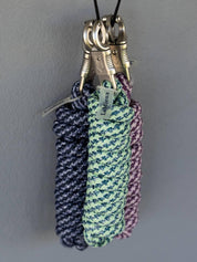 View of a group of LeMieux Quick Release Leadropes in assorted colors on a gray background