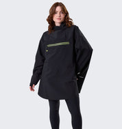 Model wearing Horseware H2O Poncho in black, front view with hood