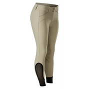 Angled front view of a model wearing the tan Equinavia Maud Knee Patch Breeches on a white background
