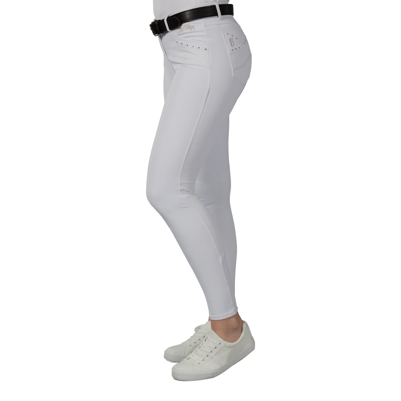 Side view of a model wearing the white B Vertigo Olivia Sillicon Full Seat Breeches on a white background