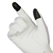 Hand wearing Equinavia B Vertigo Lux Show Glove in white demonstrating black touchscreen fingertip on thumb and pointer finger