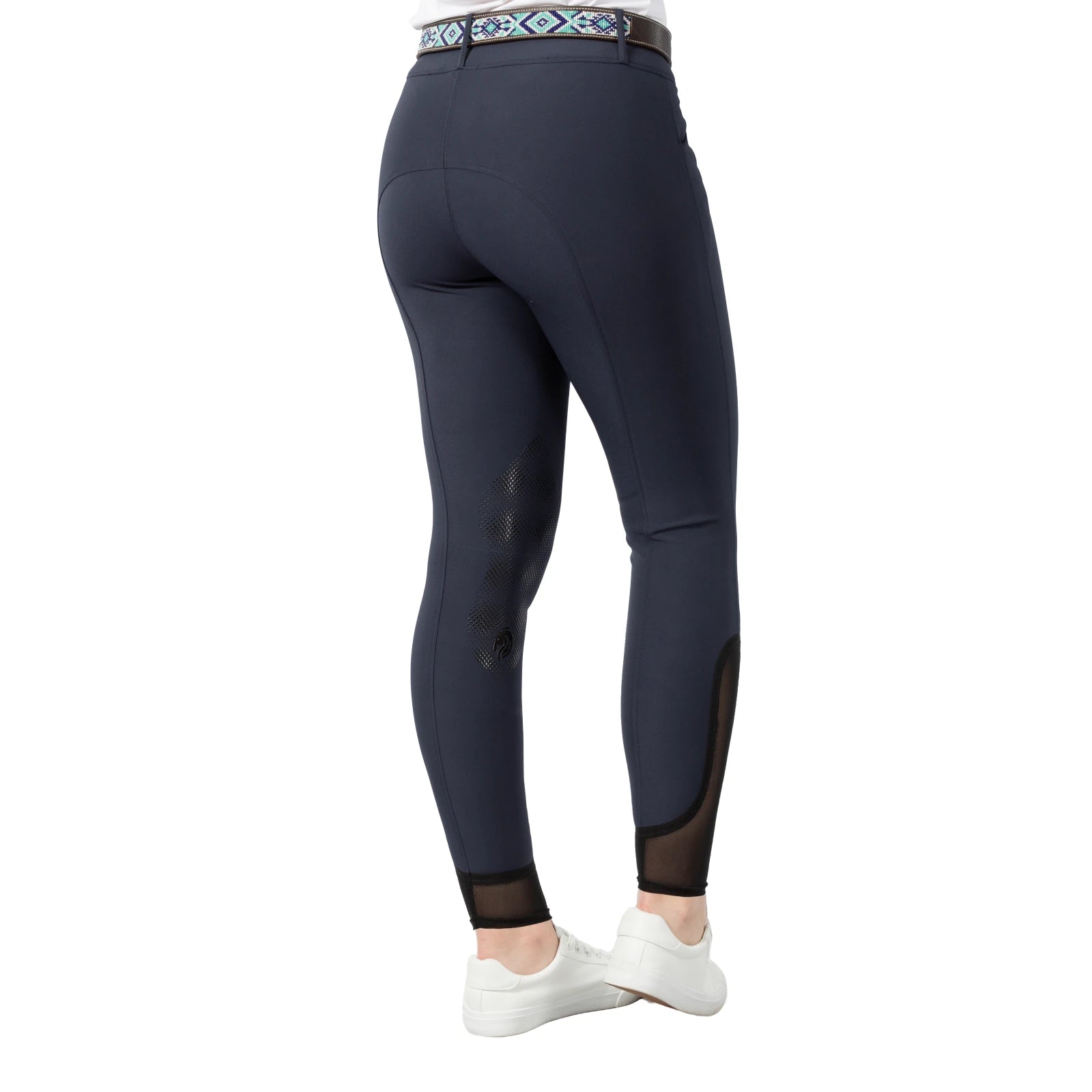 Angled back view of a model wearing the navy Equinavia Maud Knee Patch Breeches on a white background