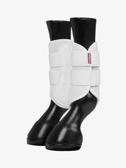 Pair of white LeMieux Mesh Brushing Boots on plastic horse legs