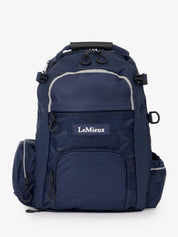 Front view of the navy LeMieux Pro Rucksack on a white background