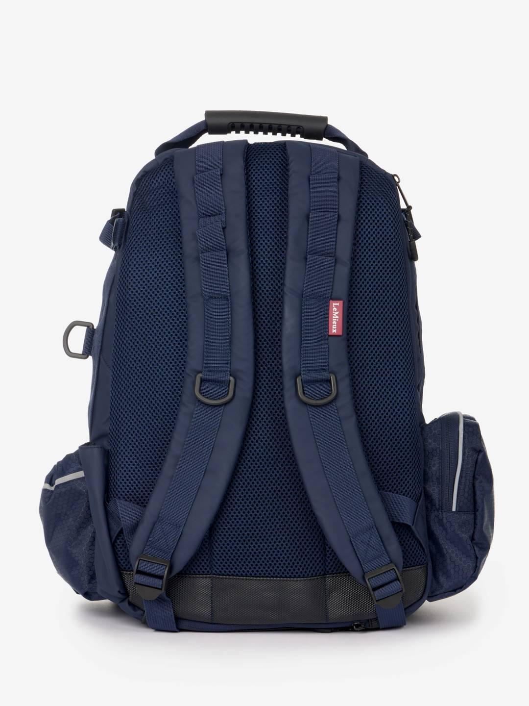 Back view of the navy LeMieux Pro Rucksack on a white background