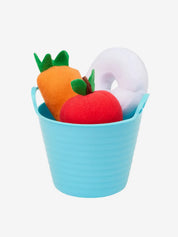 Front view of a blue LeMieux Toy Pony Treat Bucket filled with a stuffed carrot, apple, and peppermint on a white background