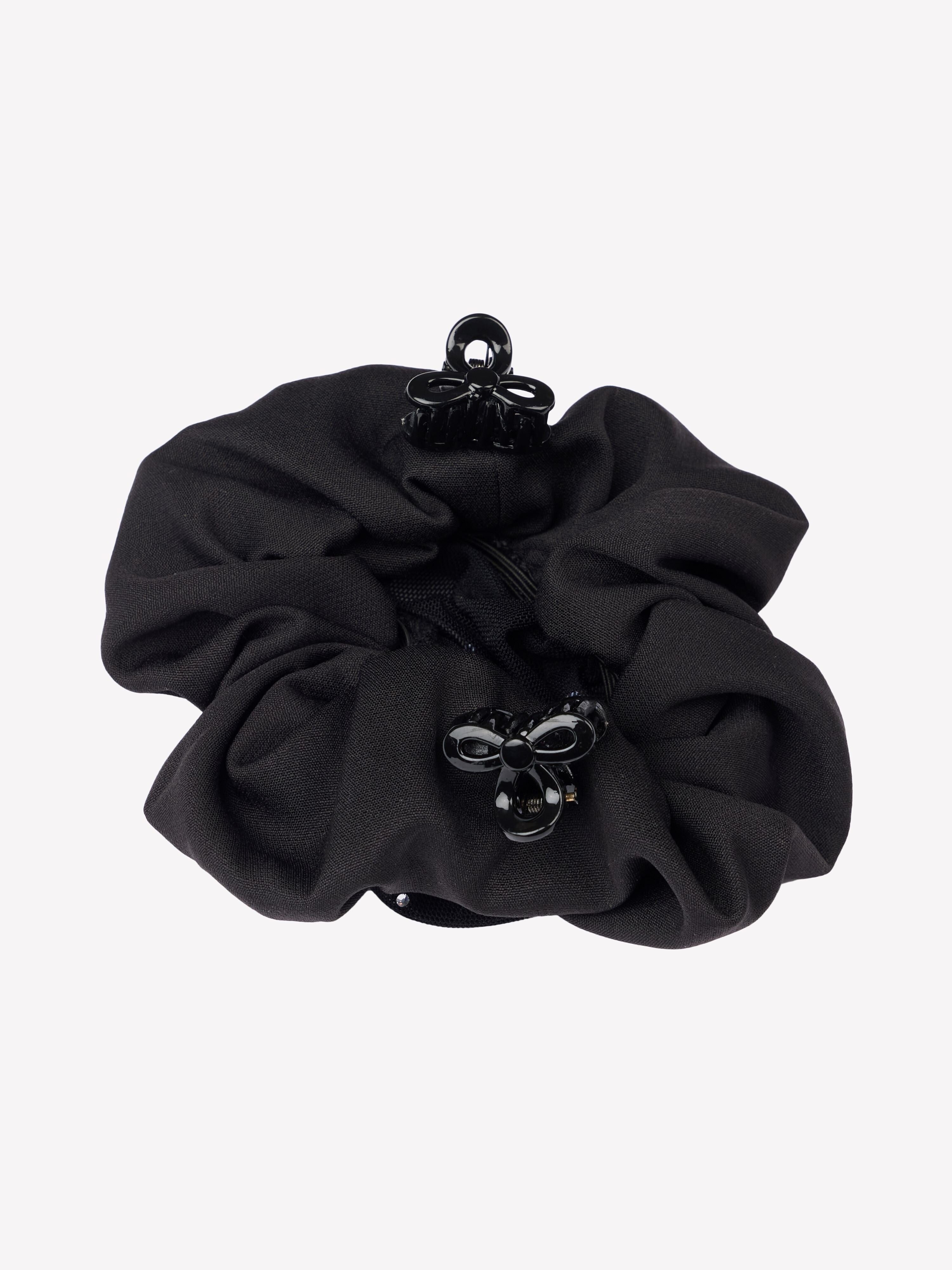 Bottom view of the black LeMieux Scrunchie With Crystal Hair Net with clips on a plain background