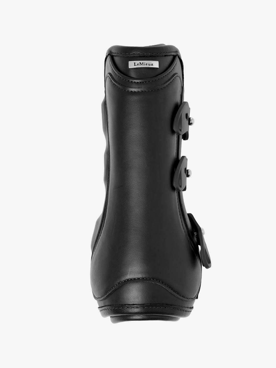 Back view of a black LeMieux Capella 3 Strap Tendon Boot on a white background
