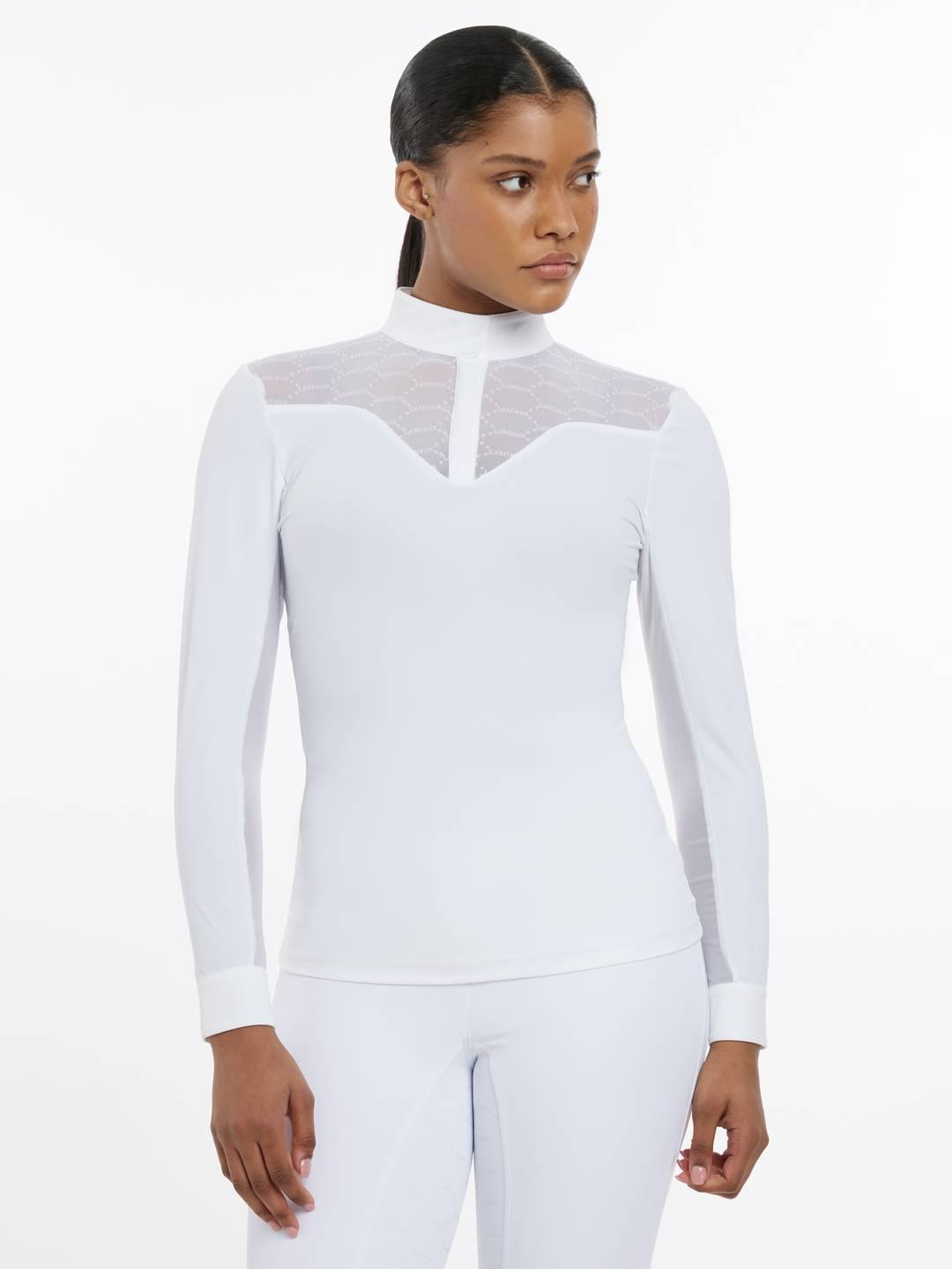 Front view of a female model wearing the white LeMieux Emily Long Sleeve Show Shirt on a plain background