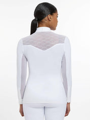 Back view of a female model wearing the white LeMieux Emily Long Sleeve Show Shirt on a plain background