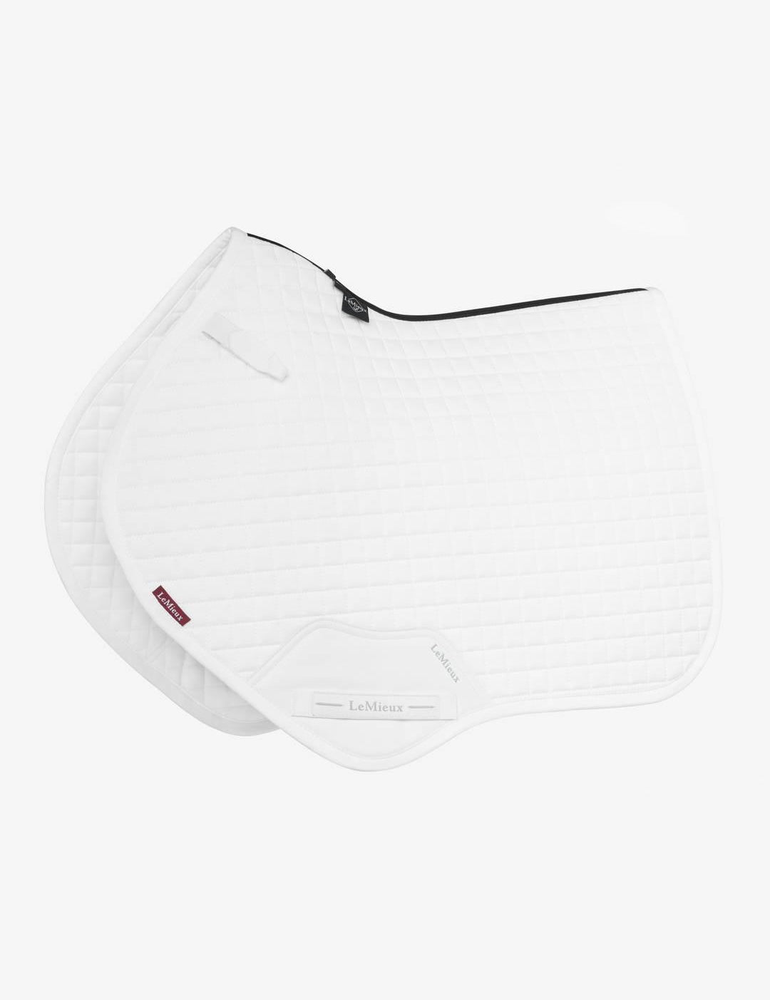 Side view of the white LeMieux Cotton Close Contact Square Pad on a white background