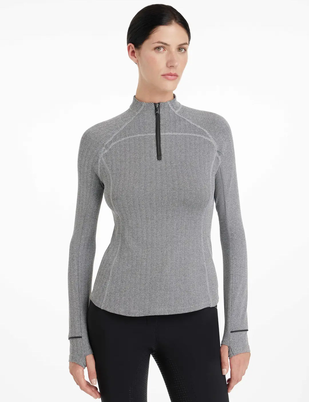Front view of a model wearing the gray LeMieux Aspen Herringbone Baselayer on a plain background