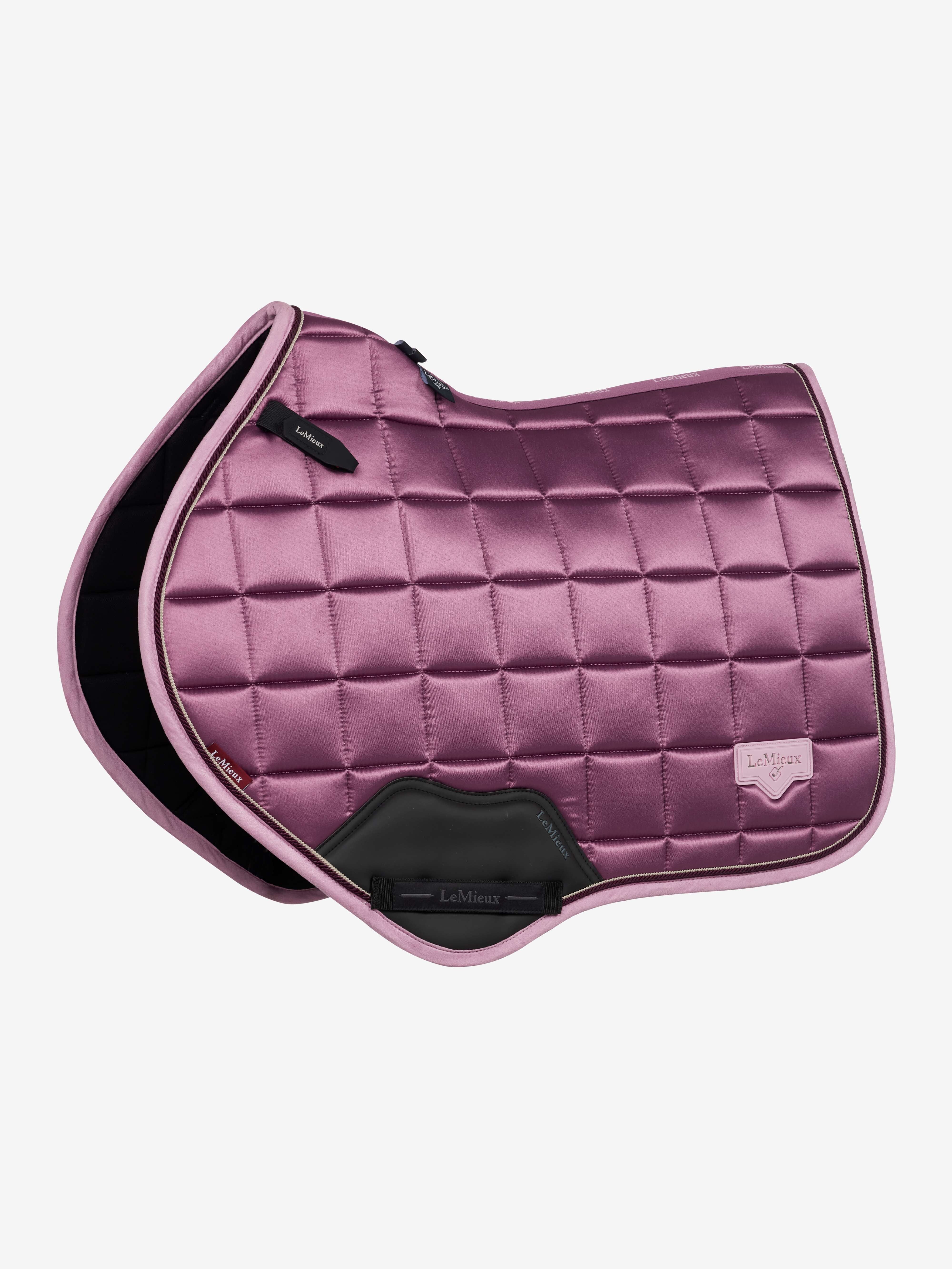 Purple quilted close contact saddle pad shown alone on a white background