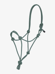 Side view of a green LeMieux Rope Halter on a white background