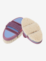 Top and bottom views of the Lemieux Flexi Goats Hair Body Brush in purple and light blue with cream colored bristles on a white background