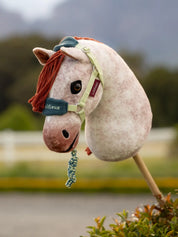 LeMieux Hobby Horse Vogue Headcollar & Leadrope in green and blue on hobby horse outside