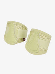LeMieux Toy Pony Mesh Brushing Boots in green on a white background