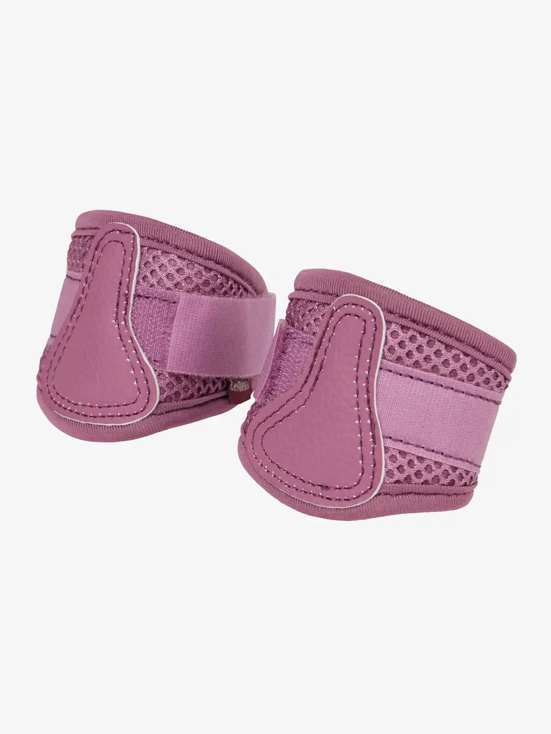 LeMieux Toy Pony Mesh Brushing Boots in pink on a white background