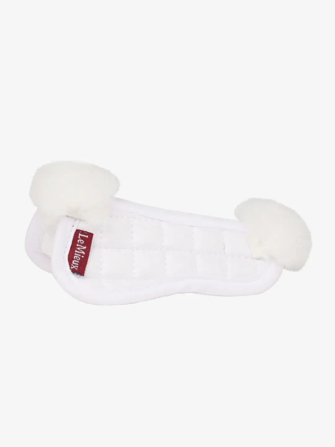 Side view of the white LeMieux Toy Pony Merino Half Pad on a white background