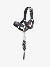 Side view of the black LeMieux Toy Pony Leather Headcollar & Leadrope on a white background