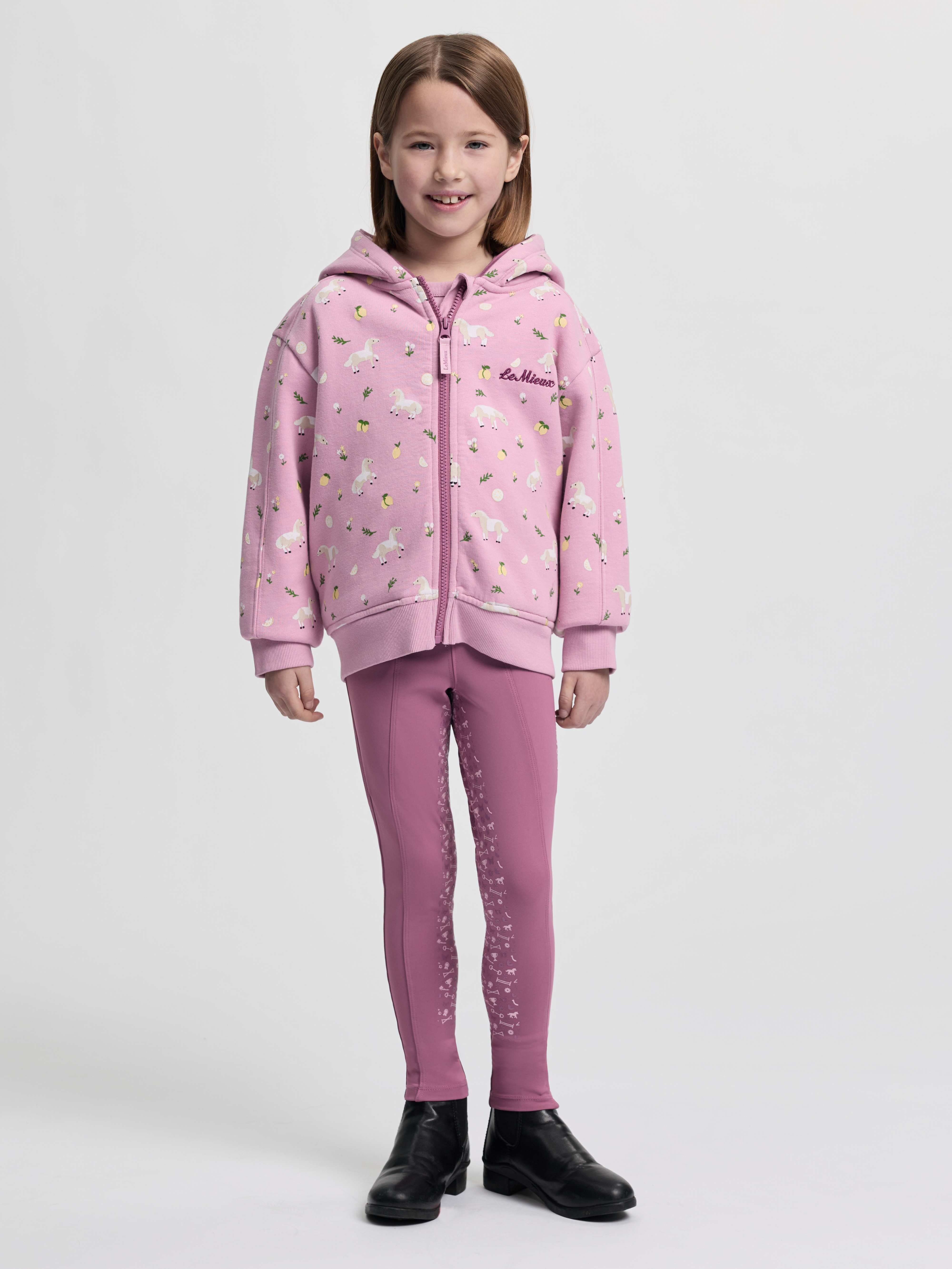 LeMieux Mini Charlie zip through hoodie in Fondant worn with matching pink leggings