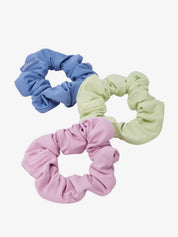 Full view of 3 Light LeMieux Scrunchies on a plain background