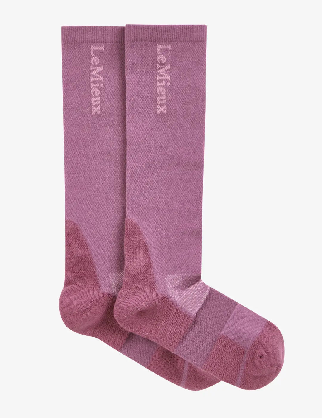 Side view of a pink pair of LeMieux Performance Socks on a white background