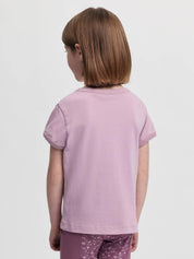 Back view of a young female model wearing the fondant LeMieux Mini Alex T-Shirt on a plain background