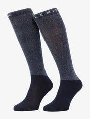 Side view of a pair of navy LeMieux Brilliance Competition Sock on a white background