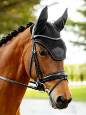 Angled front view of a bay horse wearing the black LeMieux Brilliance Fly Hood