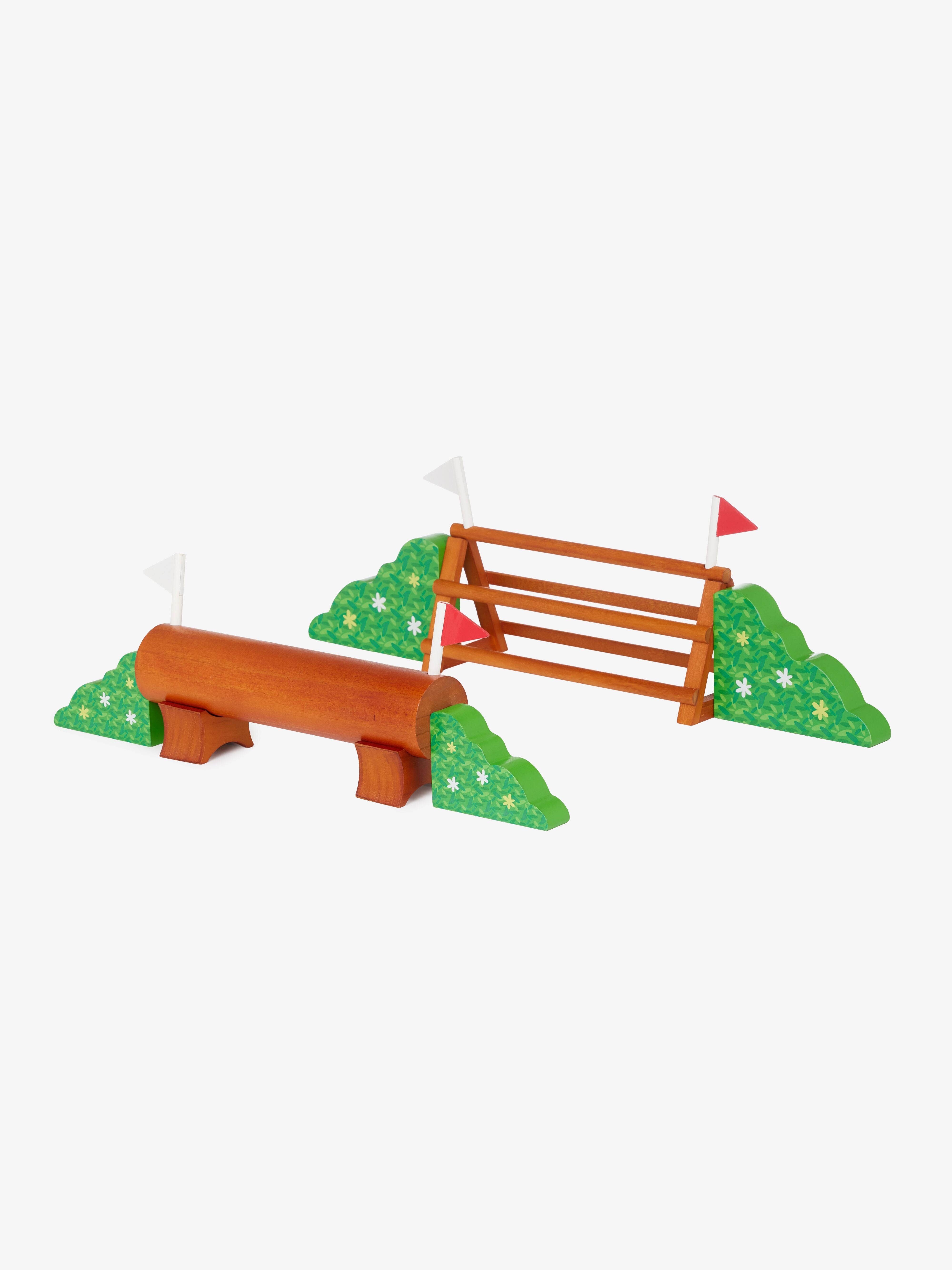 Full view of the jumps made from the LeMieux Toy Pony XC Jump Set on a white background