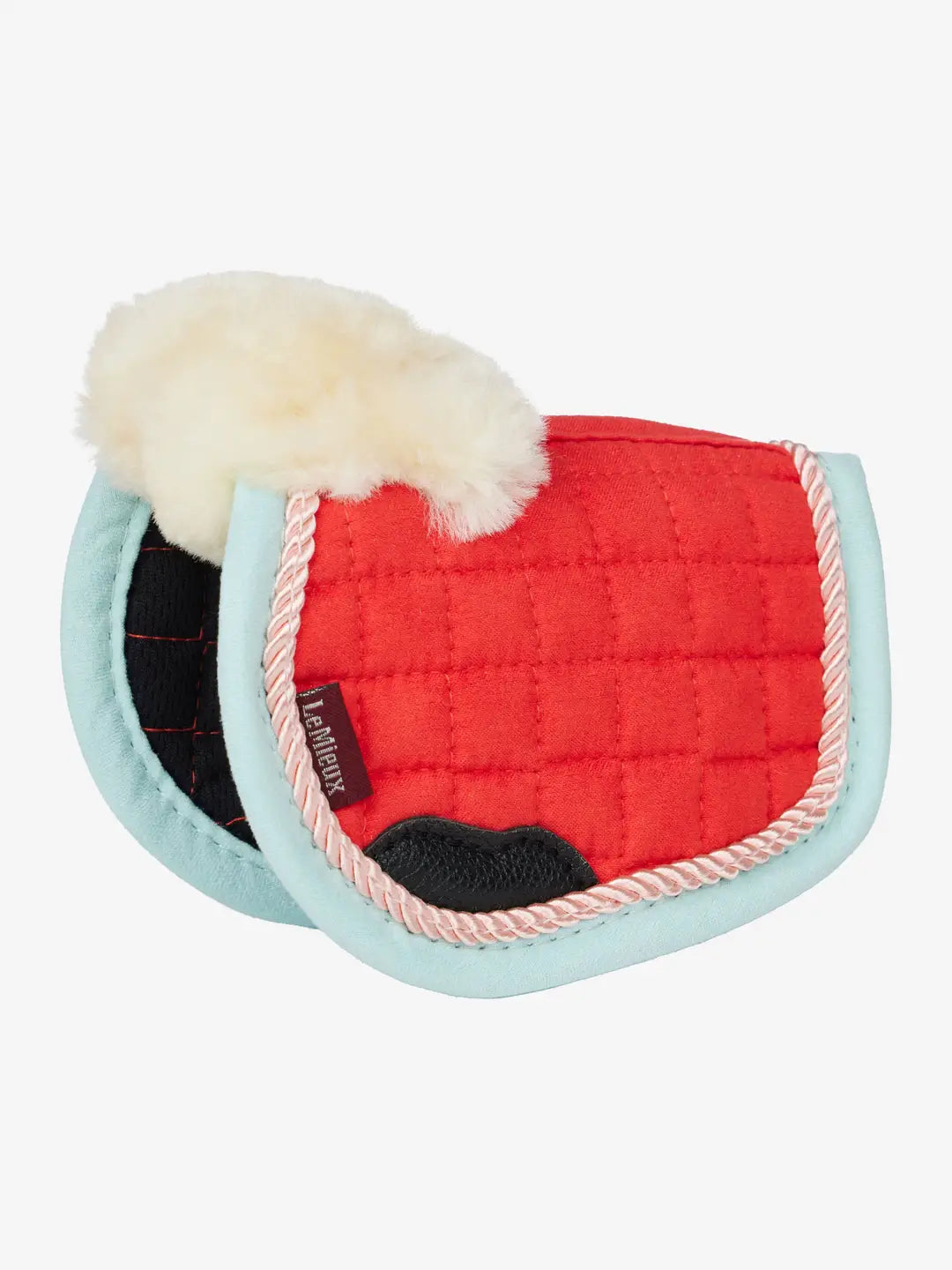 Side view of the coral LeMieux Harlow Toy Pony Pad on a white background