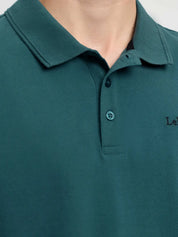 LeMieux Men’s Classique Polo Shirt in Jungle green showing collar and button placket detail
