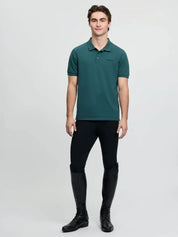 LeMieux Men’s Classique Polo Shirt in Jungle green, full body view worn with black pants