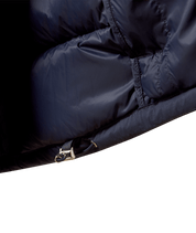Close-up view of the adjustable waist on the Odyssey Grey Ariat Ultrapuff Down Jacket on a white background