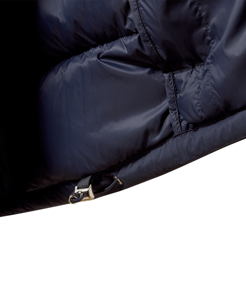 Close-up view of the adjustable waist on the Odyssey Grey Ariat Ultrapuff Down Jacket on a white background