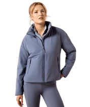 Front view of a female model wearing the Grisaille Ariat Cocoon Insulated Jacket on a white background