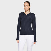 Front view of a female model wearing the Navy Samshield Lisa Twisted Sweater on a plain background