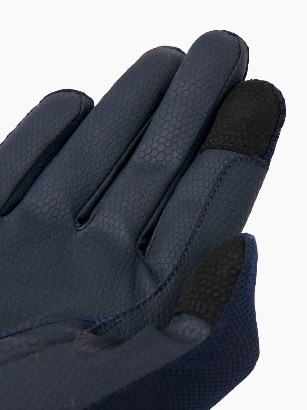 Close-up view of the palm of the navy LeMieux 3D Mesh Riding Gloves on a white background