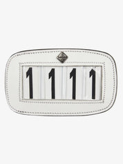 Front view of the LeMieux Saddle Number Holder in White showing numbers 1111