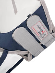Close-up view of the chin velcro on the navy Lemieux ArmourShield Pro Full Fly Mask