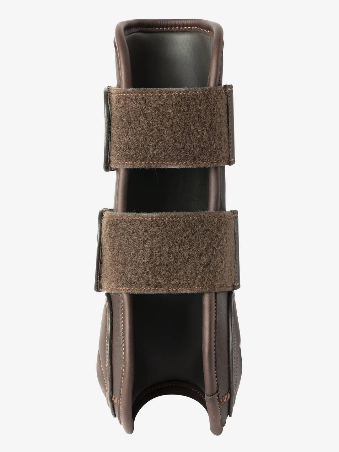 Front view of a brown LeMieux Capella Tendon Boots on a white background