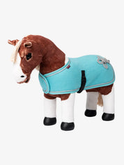 Aqua toy fleece cooler on a stuffed paint horse on a white background