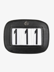 Front view of the LeMieux Saddle Number Holder in Black showing numbers 111